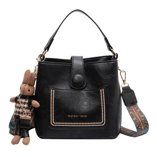 Vintage Style PU Leather Bucket Bag with Wide Patterned Strap & Optional Bunny Charm(black)
