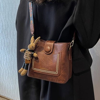 Vintage Style PU Leather Bucket Bag with Wide Patterned Strap & Optional Bunny Charm(black)
